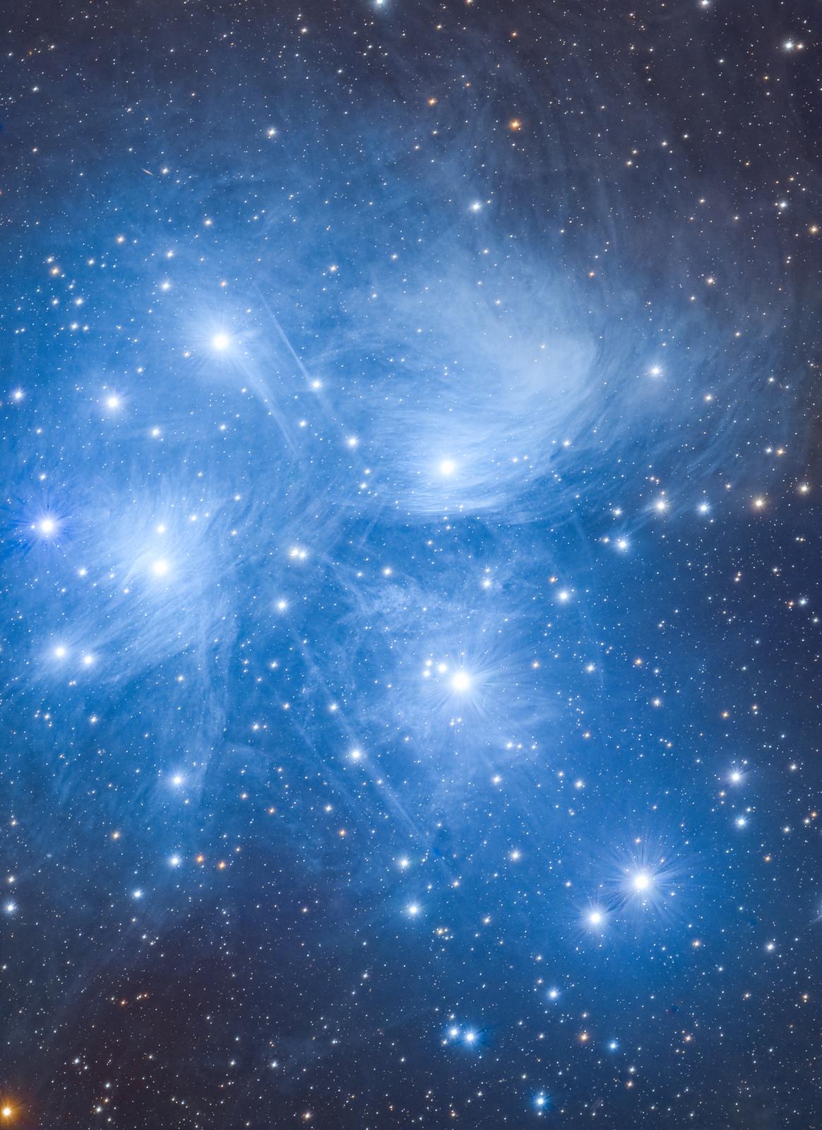 Blue hued stars in the Pleiades Cluster