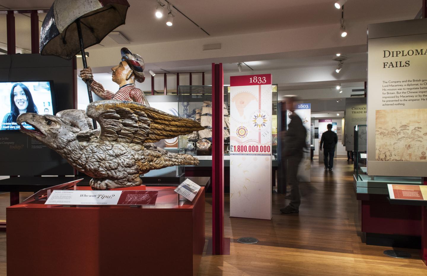 Interior view of the Traders gallery at the National Maritime Museum, with a sculpture in the foreground