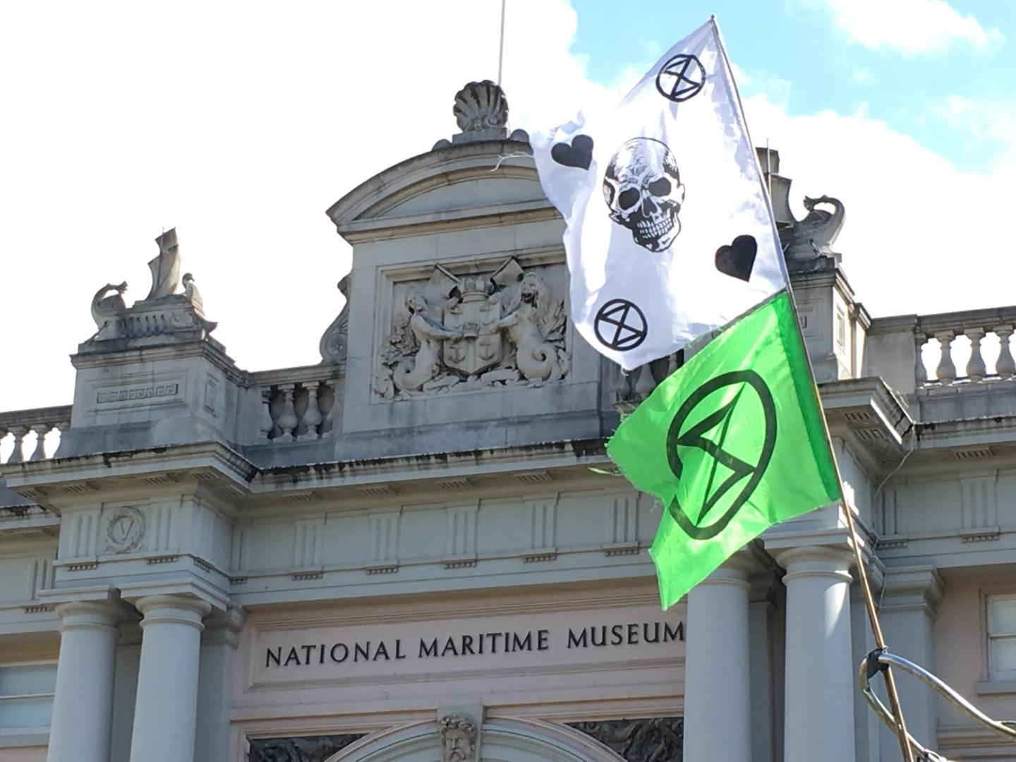 Two protest flags flying outside the National Maritime Museum 