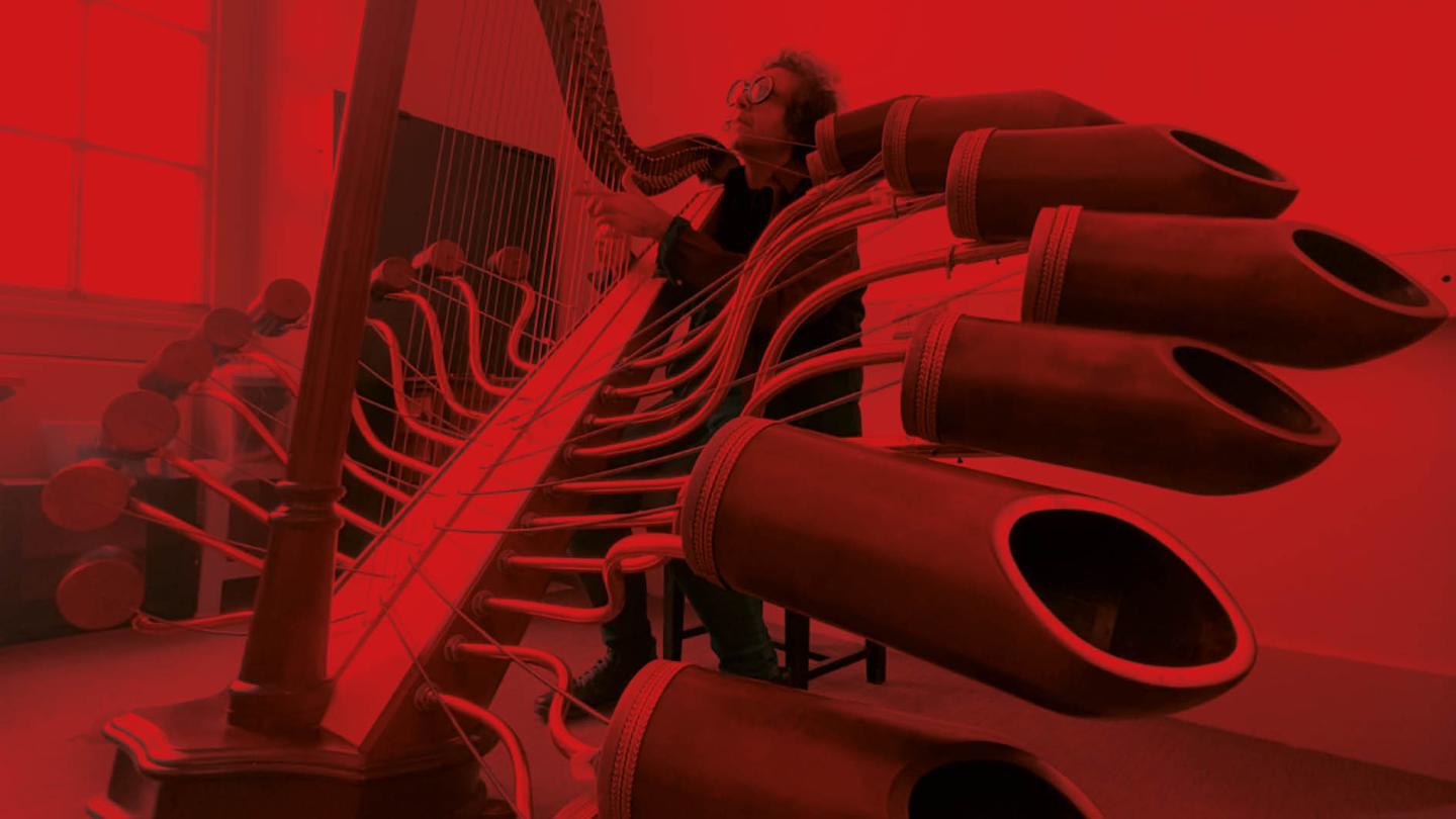 Image of a kraken harp, a harp with pipes connected to the strings