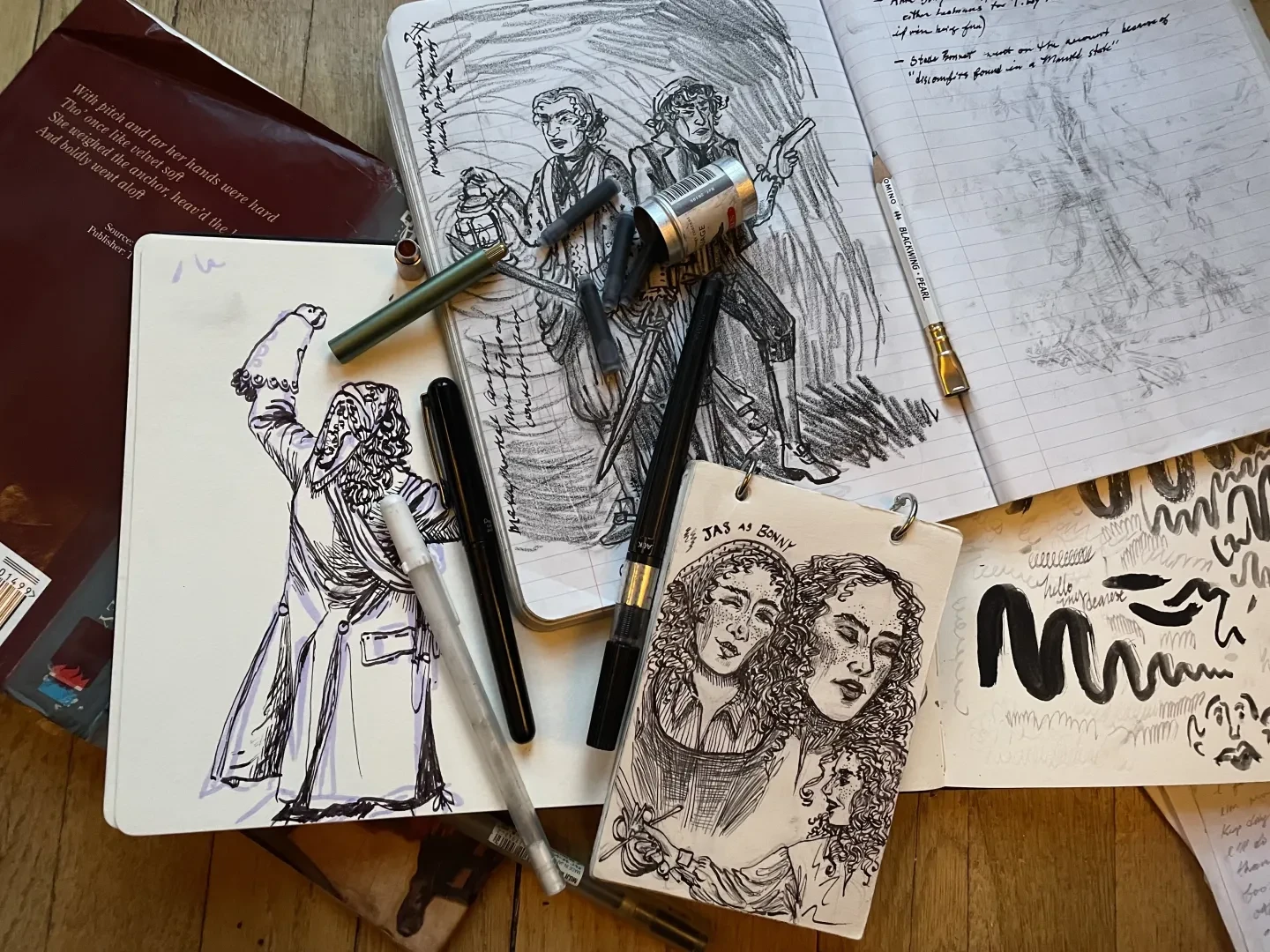 Drawings of pirates Anne Bonny and Mary Read in sketchbooks