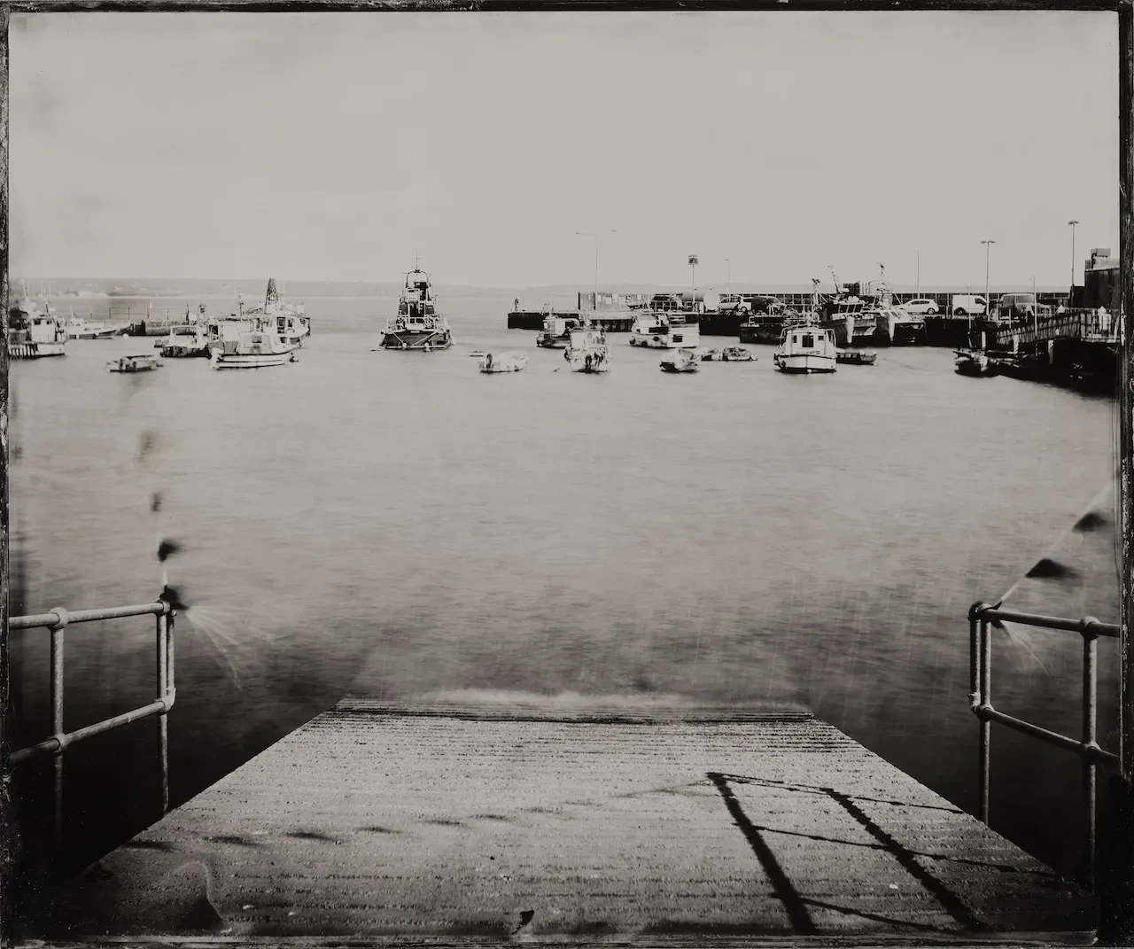 A black and white photo of the slipway at Ballycotton RNLI Lifeboat Station