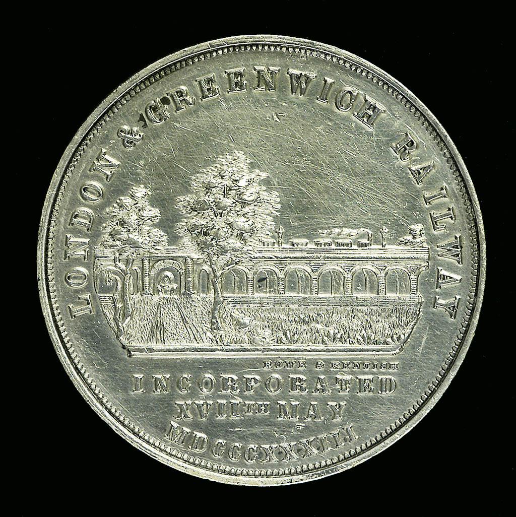 Director's token depicting the railway viaduct with a steam train travelling across it.