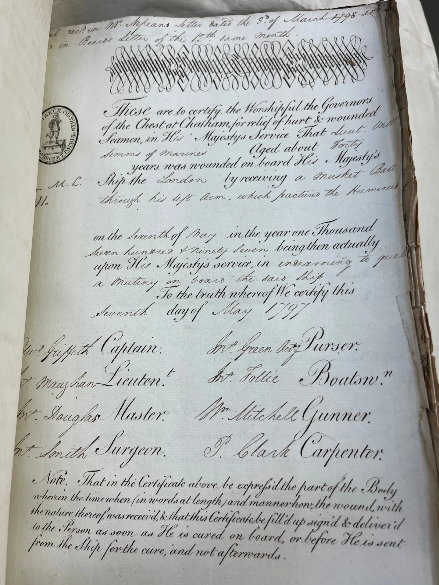 An official certificate granting a Royal Navy serviceman welfare support. The document is written in cursive script with a stamped seal on the top left corner