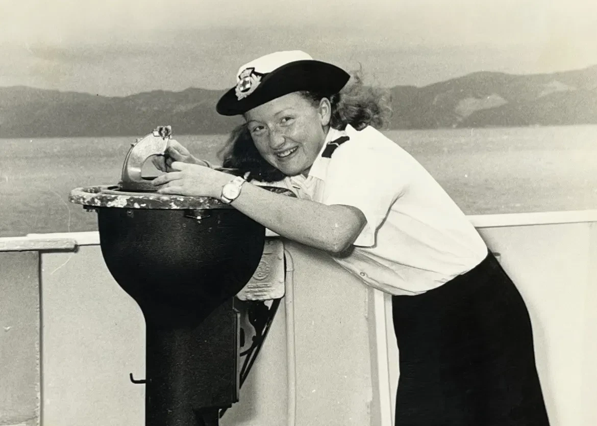 Black and white photograph of Nina Baker on deck