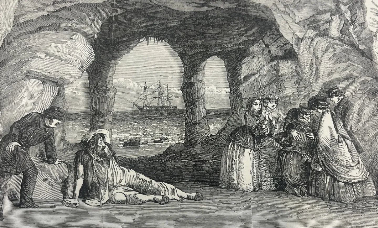 A illustration of a scene taken from Dickens' play The Frozen Deep. Figures are huddled in a cave, a ship can be seen in the distance.