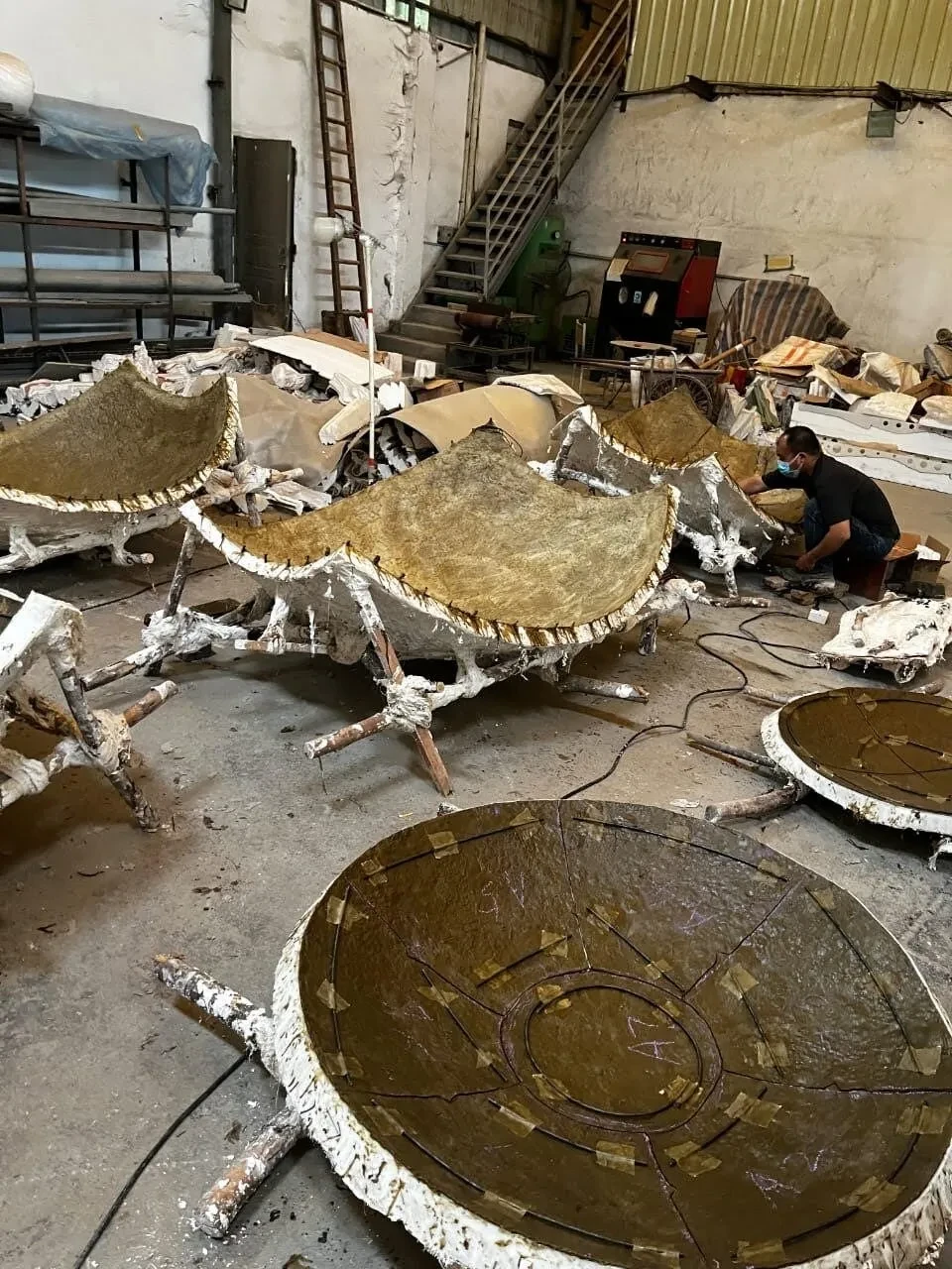 Various segments of the Mirror Moon during the creation of wax 'positives' of the process