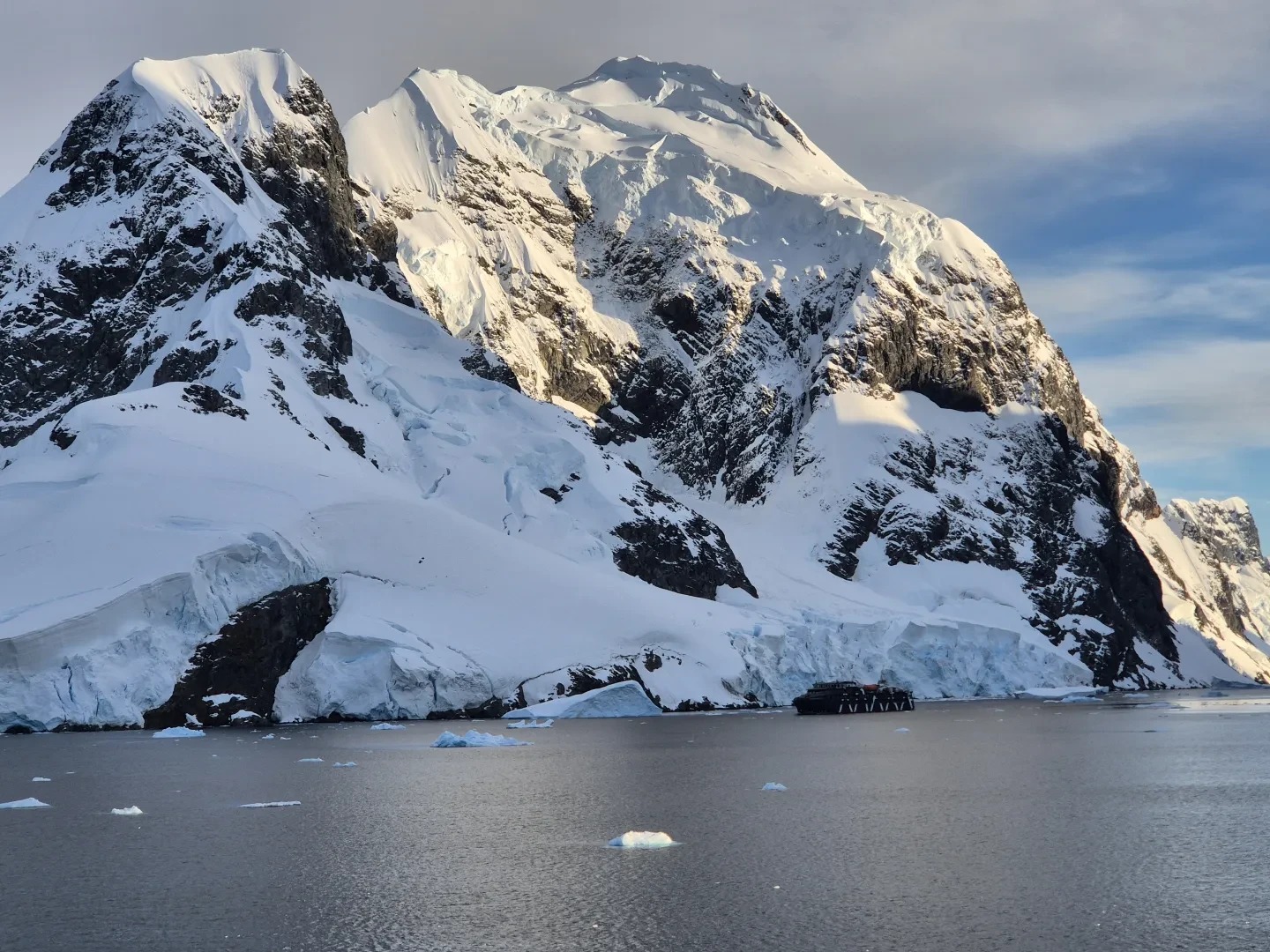 Mountain in Antarctica next to the sea