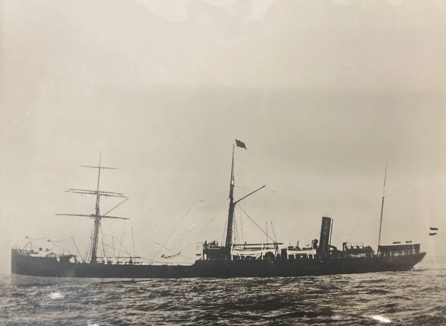 Sepia toned photograph of an early oil tanker called the Gluckauf