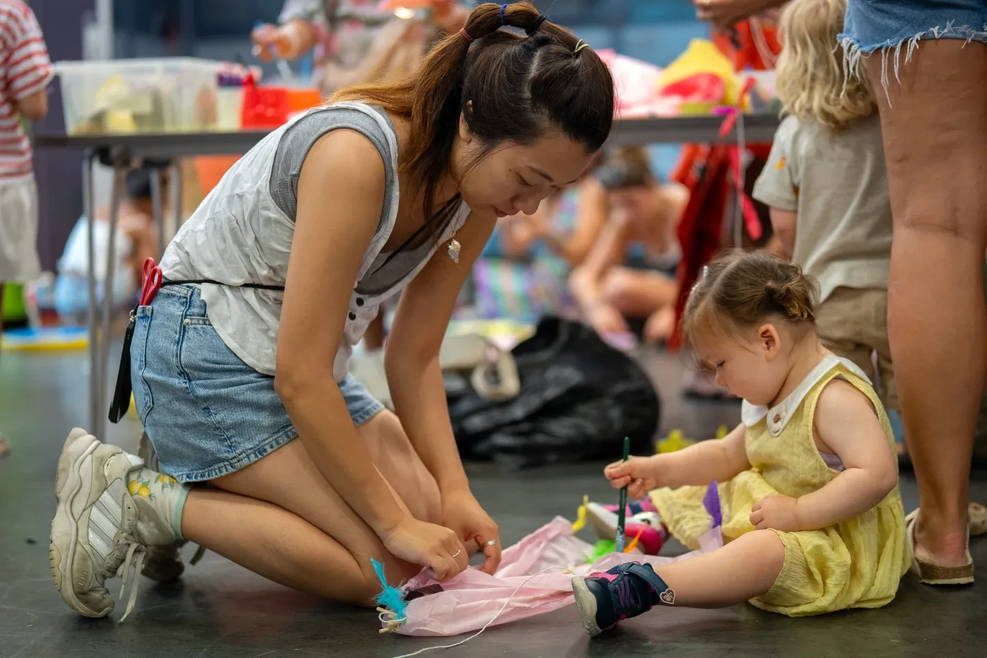 Woman and child playing
