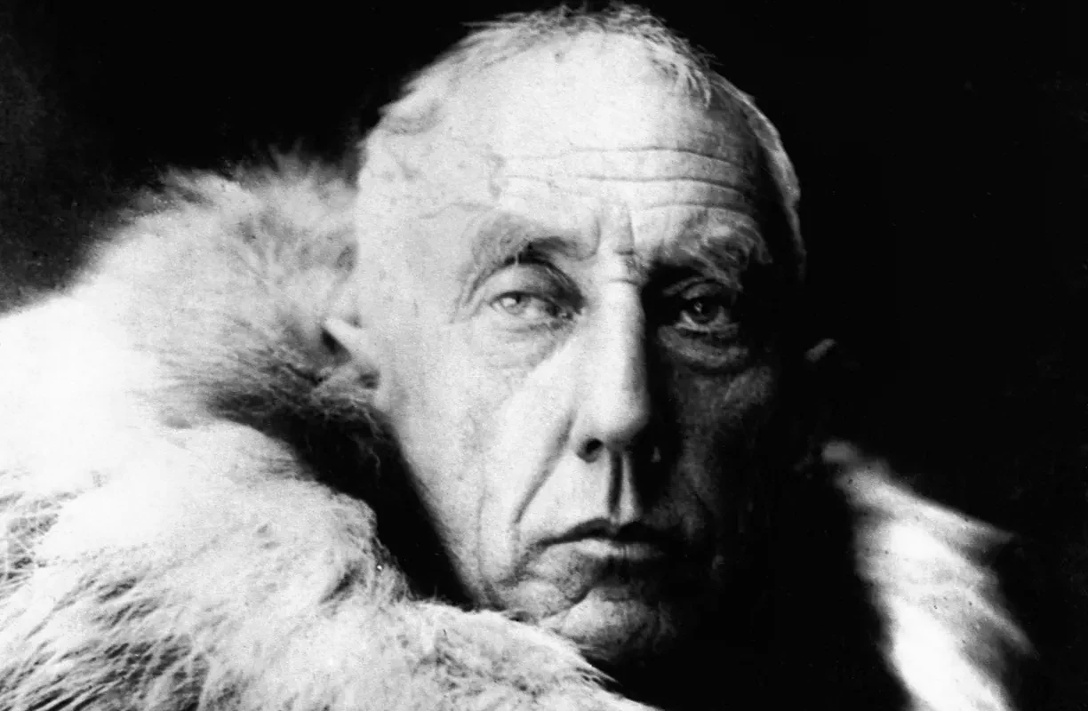 Striking black and white portrait of Amundsen in furs.