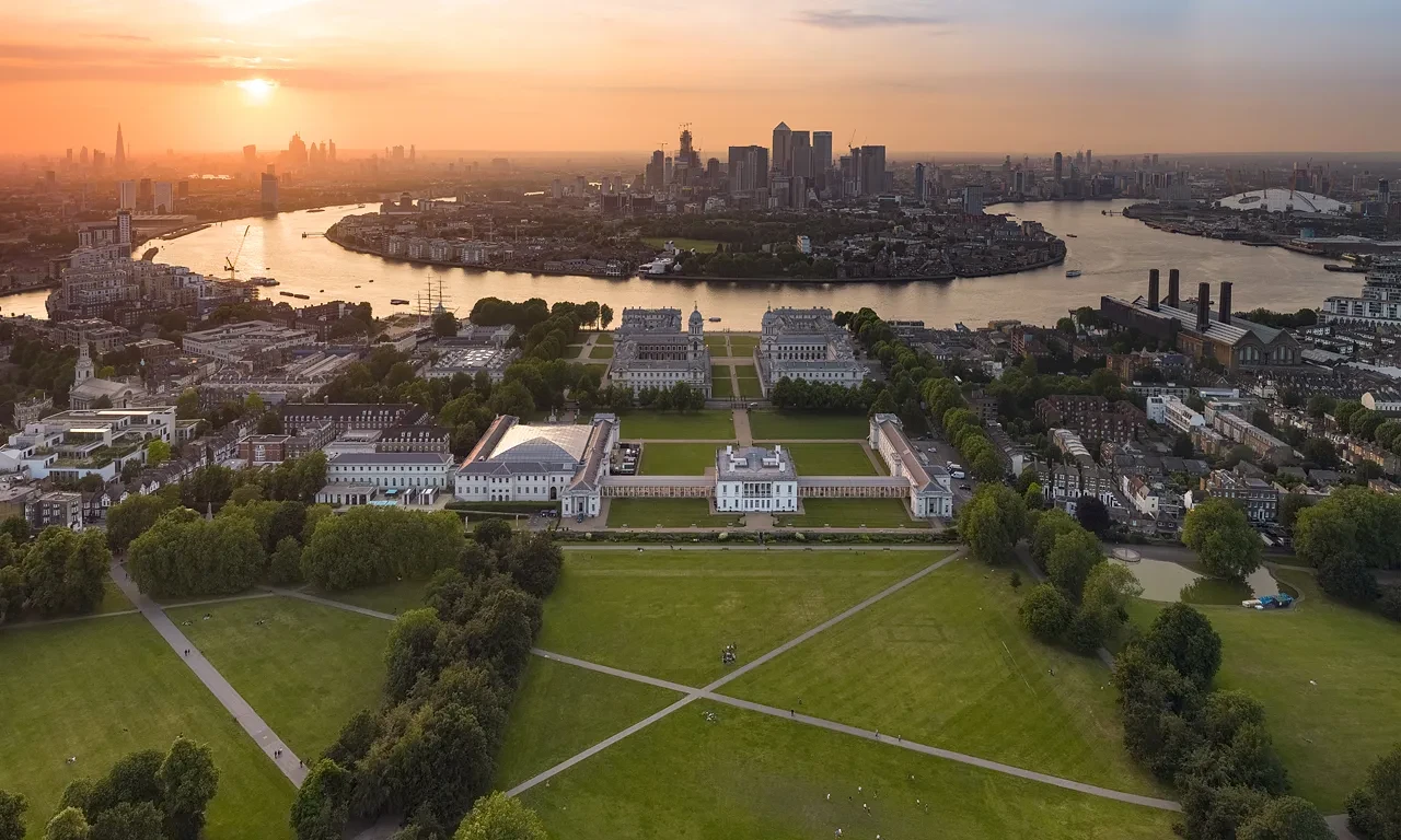 An aerial view of Greenwich at sunset.