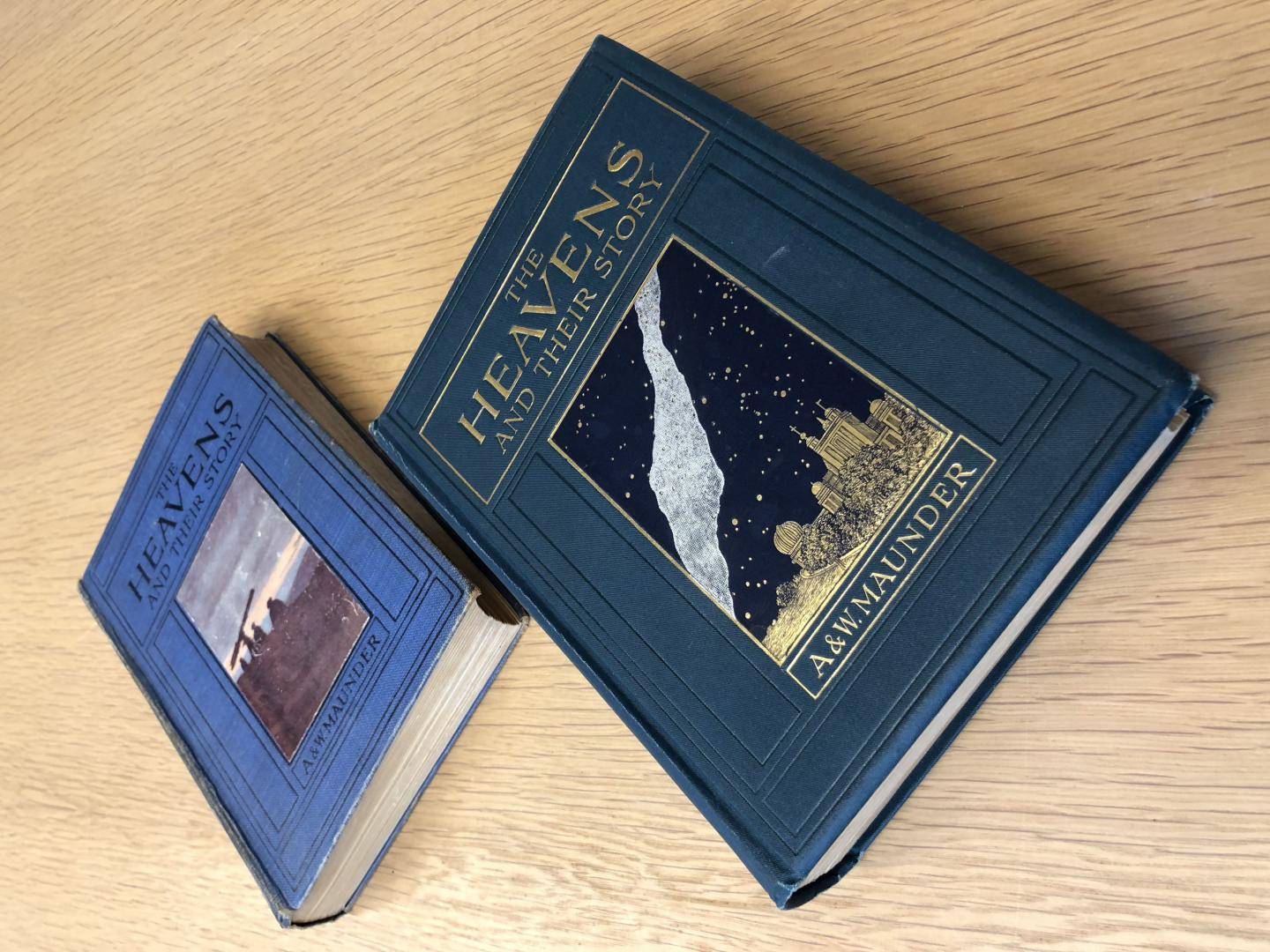 Both editions of “The Heavens and their Story” together in the Caird Library 