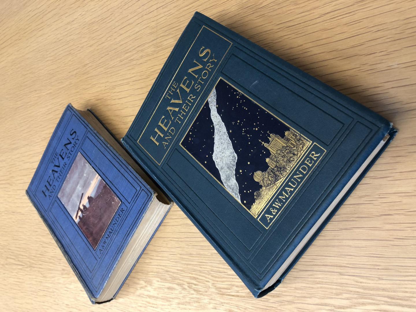 Both editions of “The Heavens and their Story” together in the Caird Library