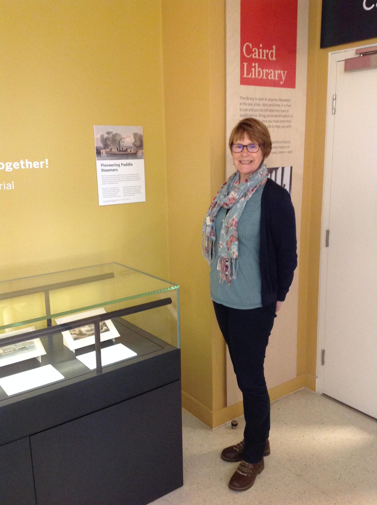 Jenny Collett by the Caird Library display case 