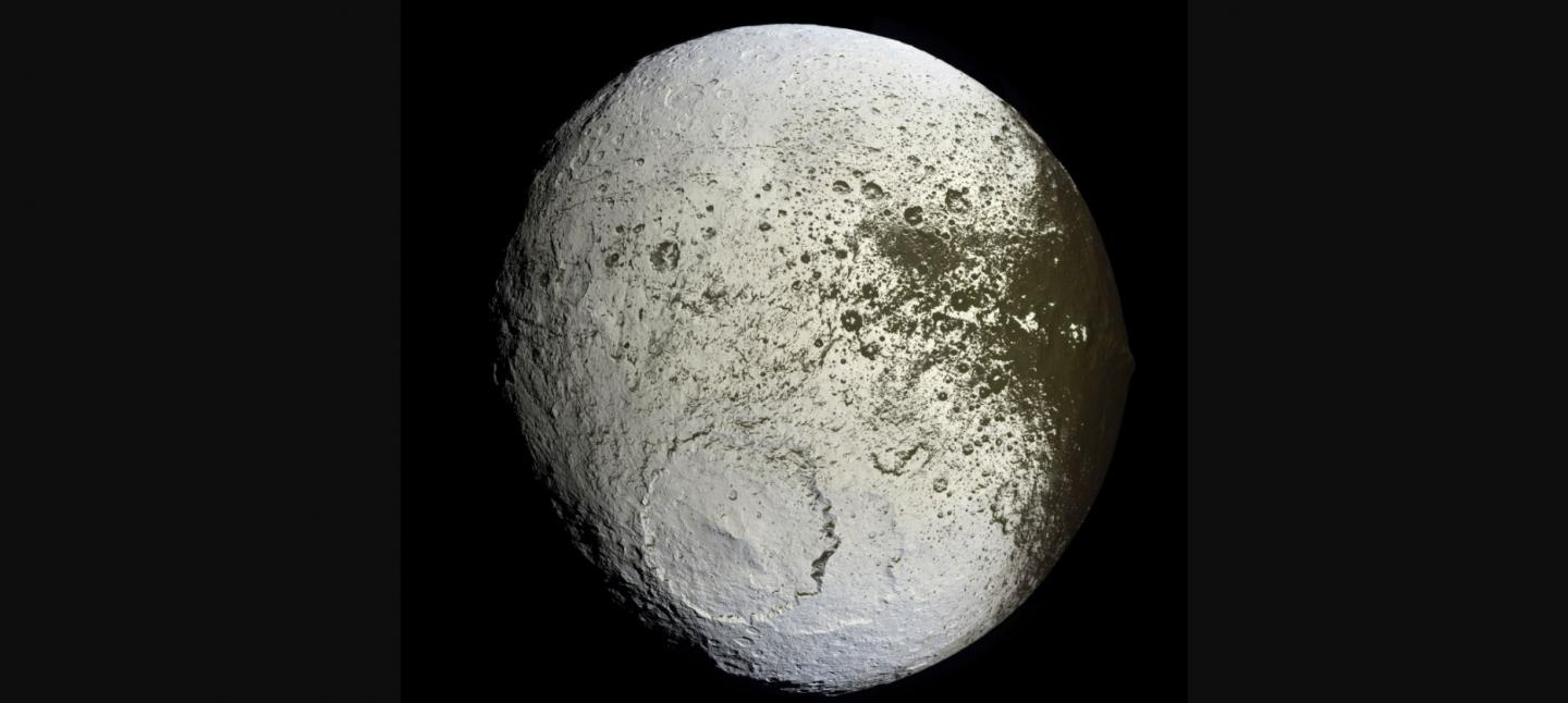 Saturn's moon Iapetus (Credit: NASA, ESA, JPL, SSI, Cassini Imaging Team)