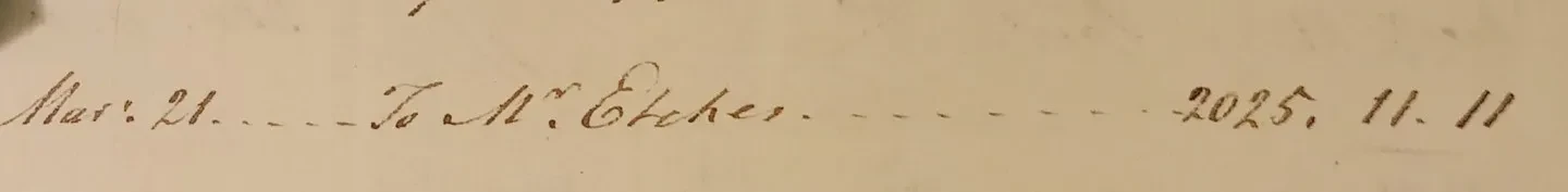 Detail of handwritten notes on brown paper.