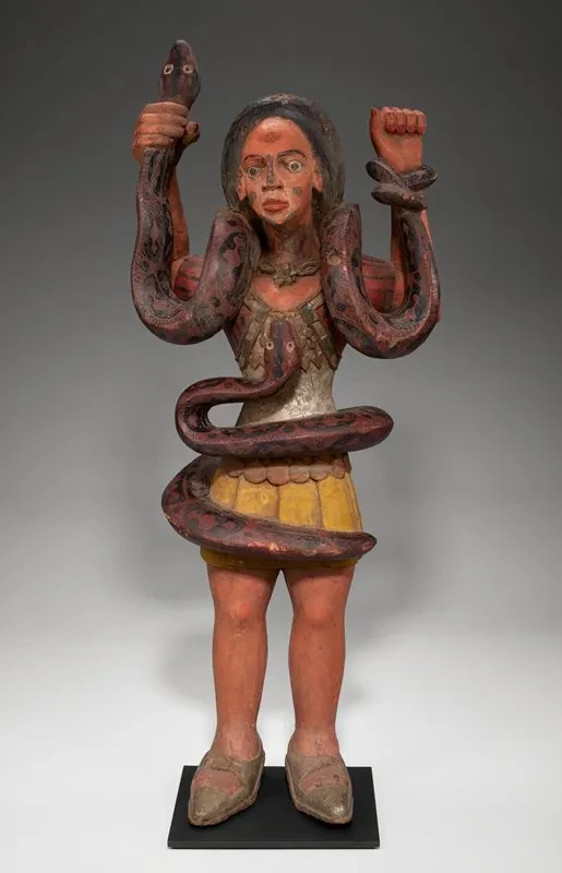 Sculpture of the African water deity Mami Wata. Nigeria (Igbo). 1950s. Wood, pigment. Original in the Minneapolis Institute of Art