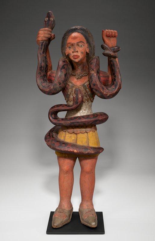 Sculpture of the African water deity Mami Wata. Nigeria (Igbo). 1950s. Wood, pigment. Original in the Minneapolis Institute of Art