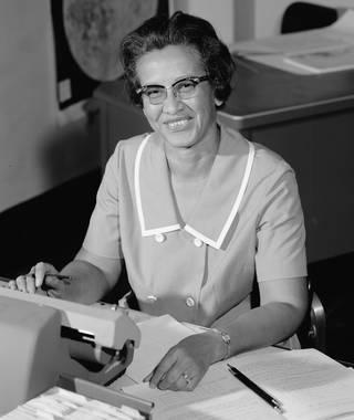 NASA research mathematician Katherine Johnson is photographed at her desk at Langley Research Center in 1966..jpeg