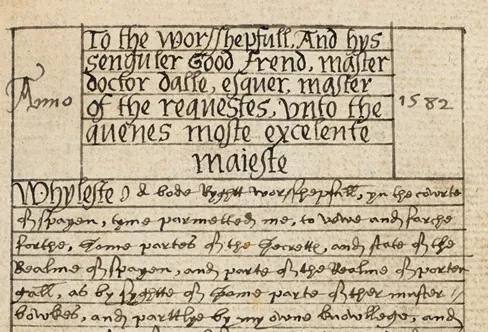 Old handwritten text in a lined grid on brown paper.