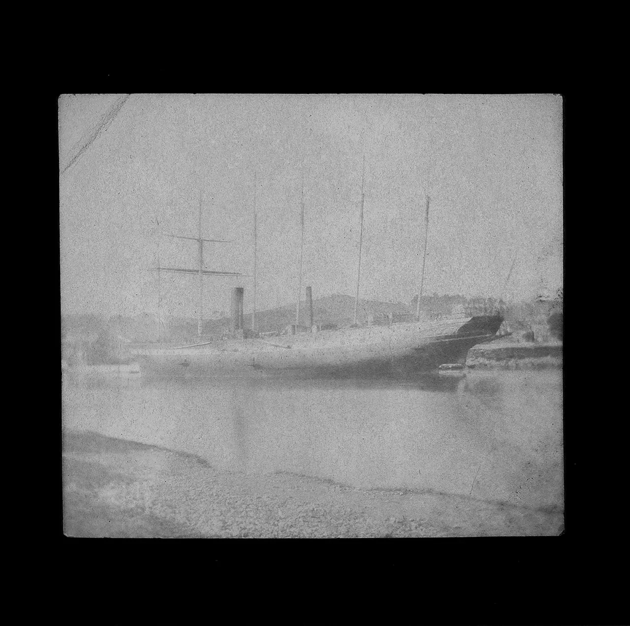 A negative image of a ship.
