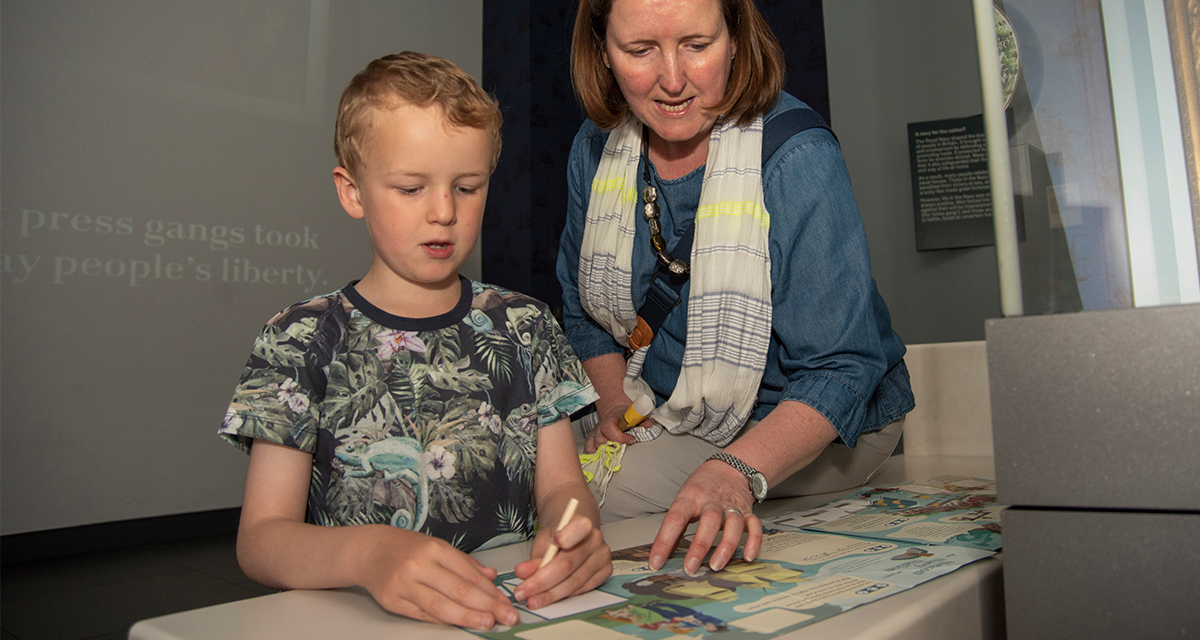 Adult and child using family trail
