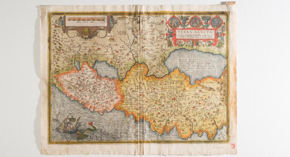 The recto of an Abraham Ortelius map with copper-green pigment present