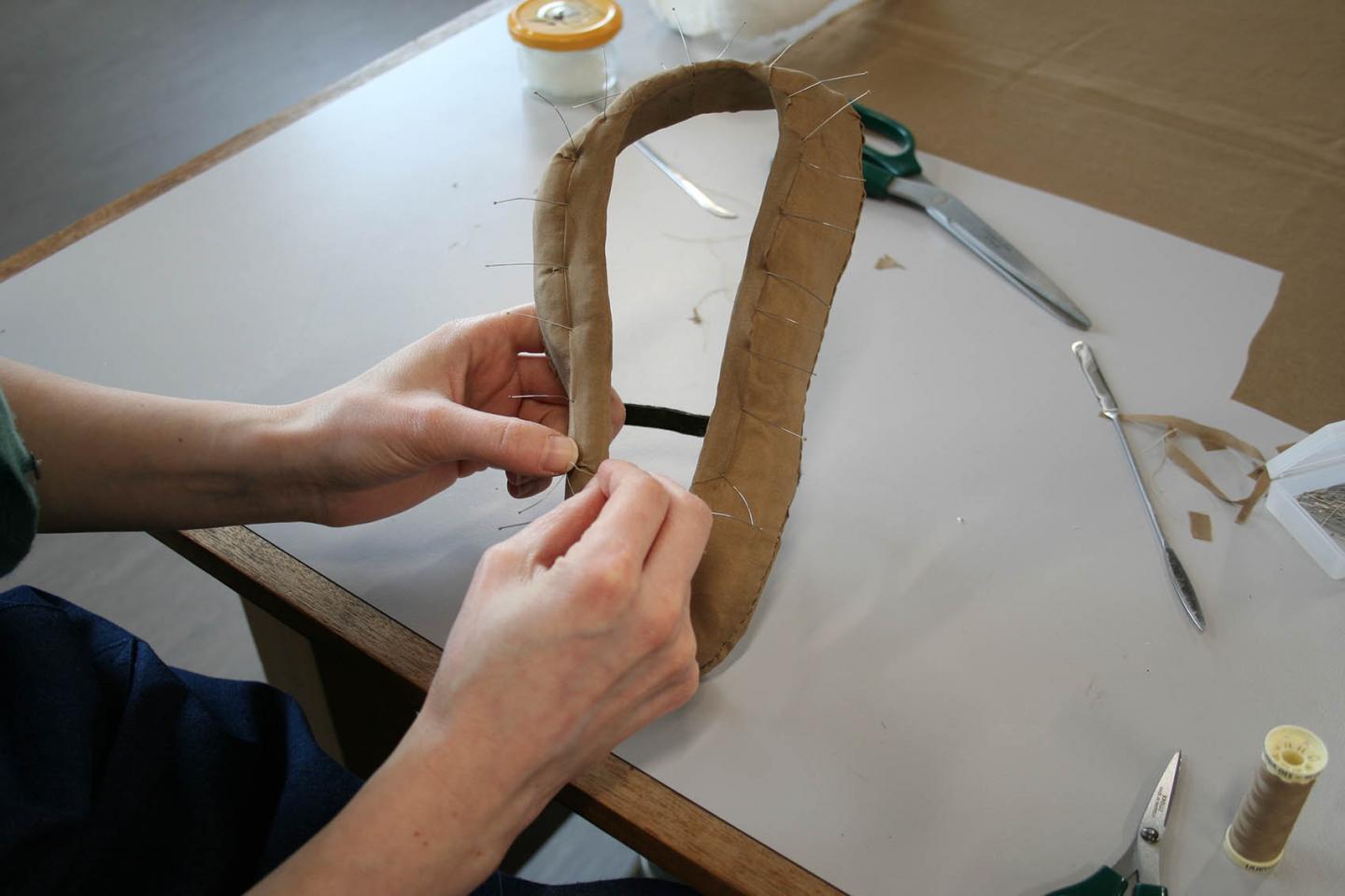 Covering the mounts for Scott's overshoes with dyed silk fabric