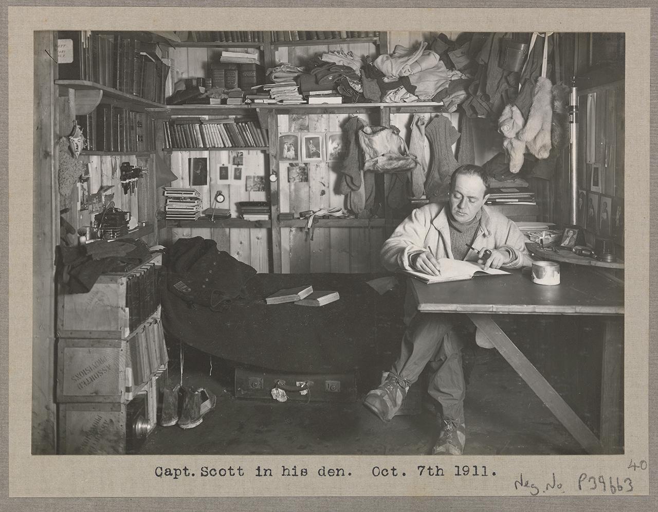 Captain Scott writing his journal before the South Pole expedition in 1911