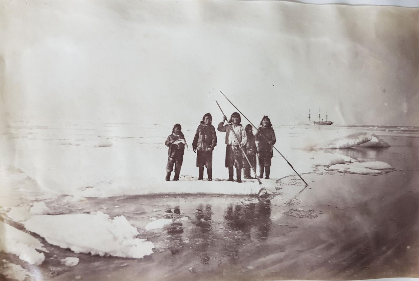 Inuit spearfishing for salmon.