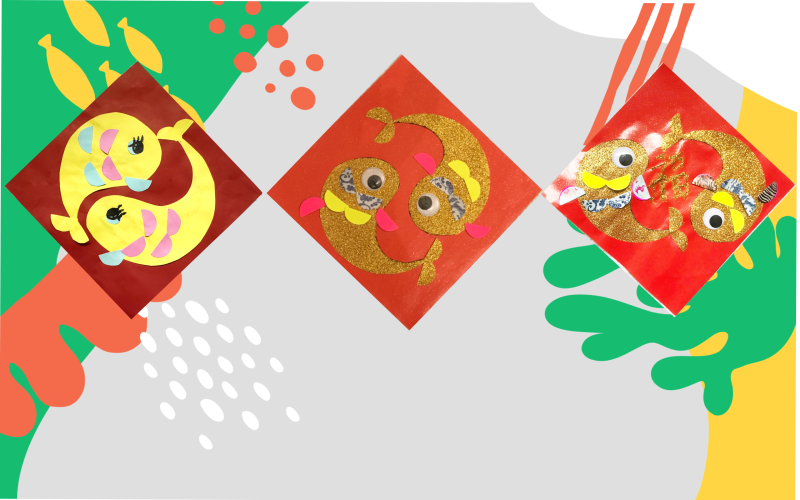 Three lucky fish posters. Each is a red diamond with a pair of yellow or gold fish.