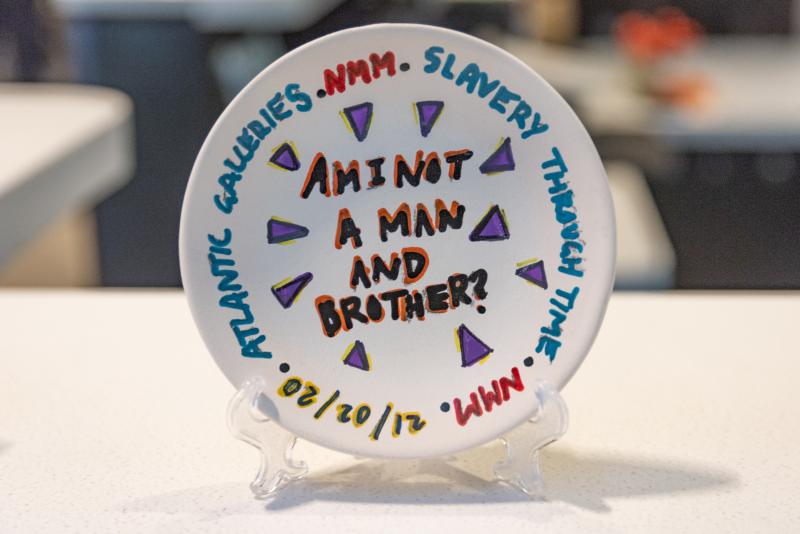 An image of a plate made for the Tours Takeover which says the quote: Am I not a Man and Brother? 
