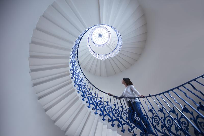 Woman walking up the tulip stairs