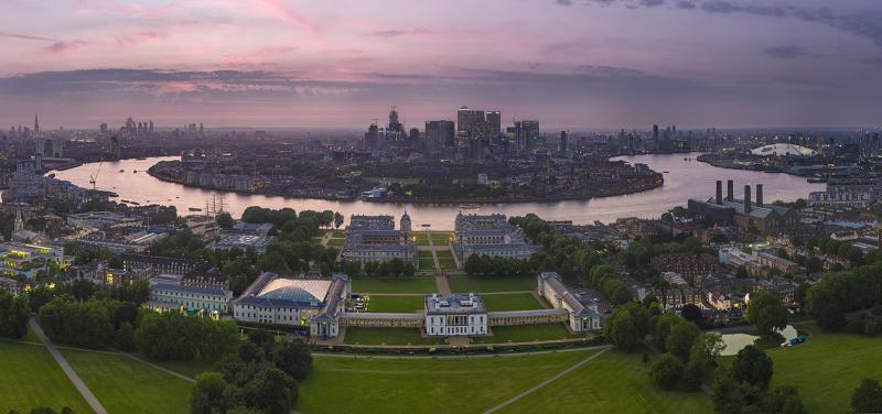 A panoramic shot of RMG with canary wharf and the thames visible in the background