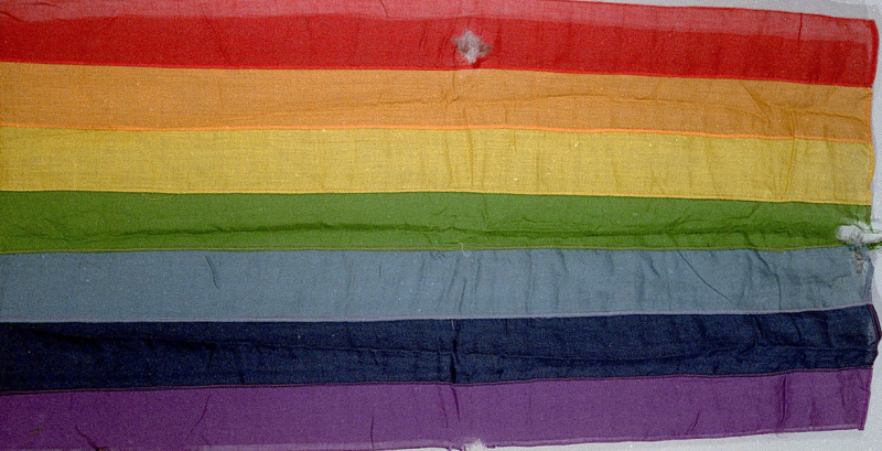A historic flag from the Royal Museums Collection in the colours of the rainbow