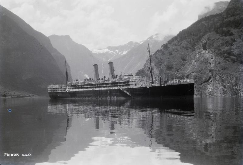 A slightly distant starboard side view, taken from ahead of the beam, of the Orient Line cruise ship Ormonde (1917) 