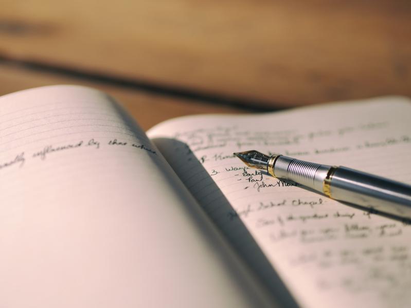Written journal and pen