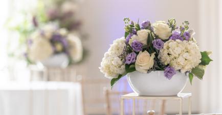 White and lilac flower arrangement on a table