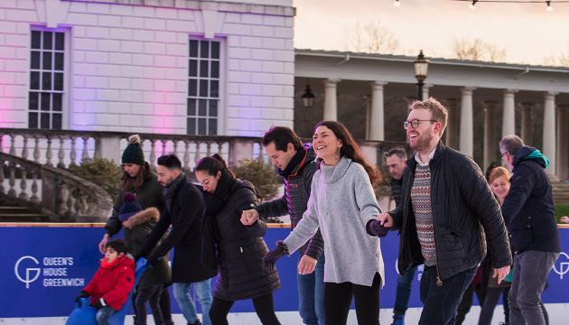 Couples and families skating at the Queen's House Ice Rink in Greenwich